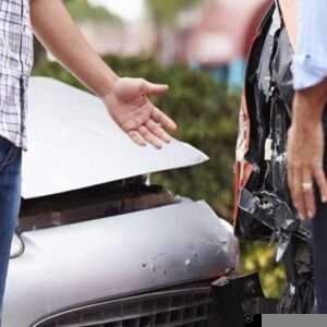 Two men argue over fault after a car accident. 