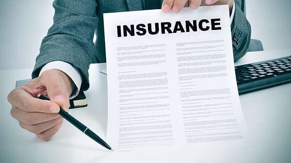 auto accident lawyer checking insurance information