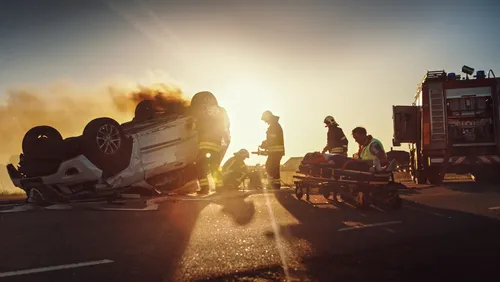 Paramedics and Firefighters rescue trapped car accident victims in Lawrenceville, GA