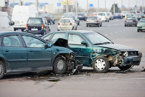 Car Accident on street with damaged cars in Winder, GA