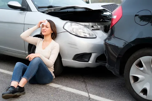 Injured girl after car accident in the street in Peachtree Corners, GA