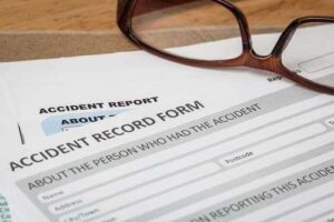 Accident record on desk of a Norcross accident attorney
