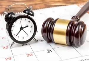 Georgia Car Accident Lawsuit Deadline Concept, Judge's Gavel With Clock and Calendar