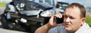 Person calling in after a car accident