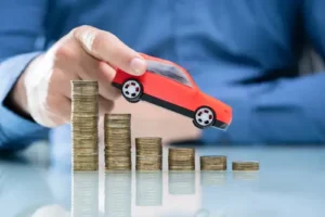 Diminished Value Claim After Car Accident, Toy Car With Stacks of Coins