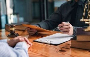 client about to hire a car accident attorney in Atlanta
