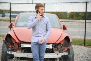 Man Calling Police After a Car Accident