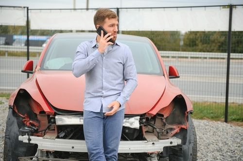 Man Calling Police After a Car Accident
