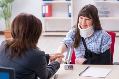 Roswell Uber accident lawyer meeting an injured woman