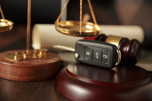 Johns Creek, GA accident lawyer getting handed the keys after a client seeks car accident compensation