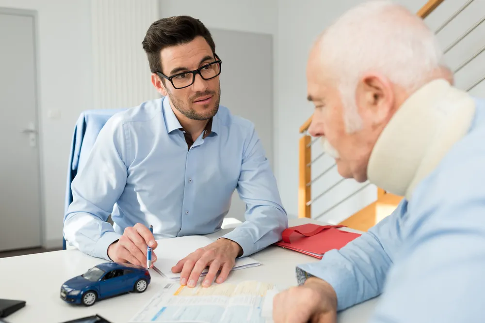 Alpharetta personal injury lawyer discussing catastrophic injuries with his personal injury victims