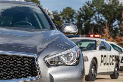 Police stopping a car for a traffic citation
