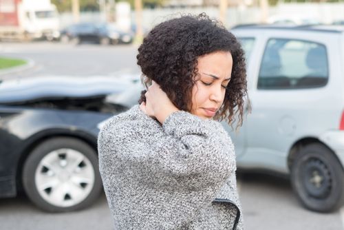 woman with whiplash injury from car accident
