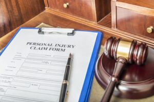 Personal Injury Lawsuit Form and Gavel - Sue an Atlanta Government Entity