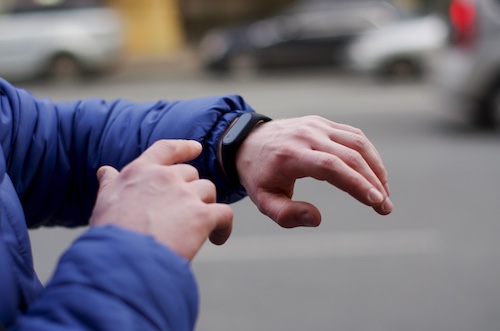 Man Using Wearable Tech