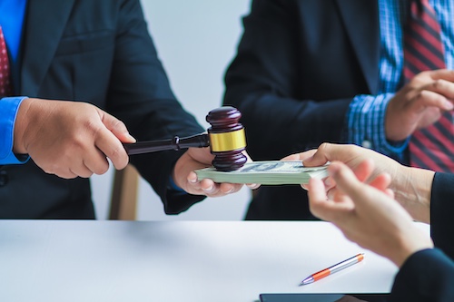 Attorneys With Money and Gavel -State Farm Settlement Payout