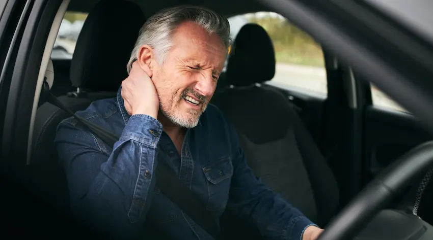 A man is experiencing neck pain and whiplash symptoms following an airbag accident collision within his vehicle in Georgia.